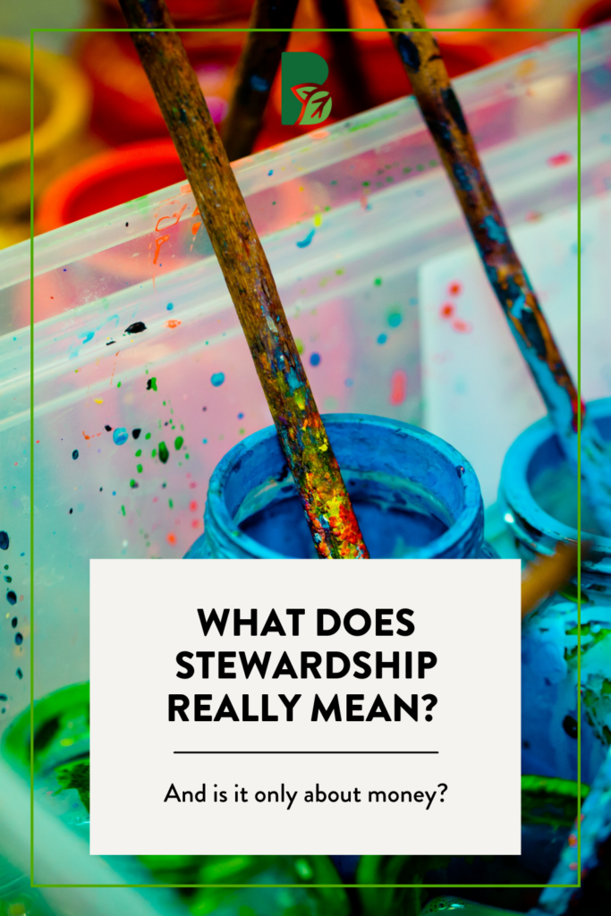 Various jars of paints with paint brushes in them, with text overlay that reads "What does stewardship really mean? And is it only about money?"