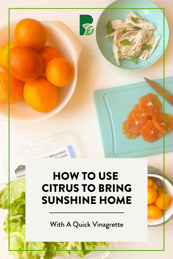 White bowl of oranges, blue bowl of chicken and herbs, blue cutting board with knife and sliced orange pieces, container of lettuce, small bowl of little oranges with text overlay that reads, "How to Use Citrus to Bring Sunshine Home".