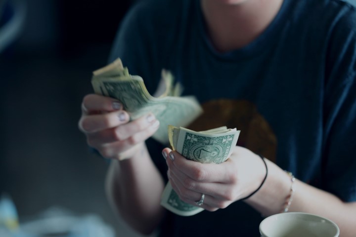 person counting money