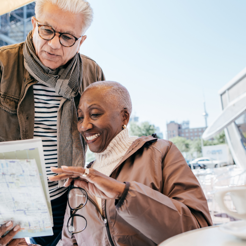 retired couple reviewing paperwork together