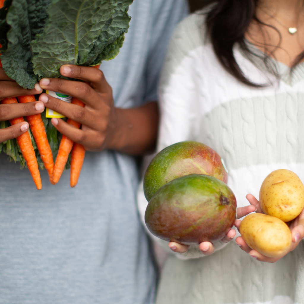 people holding produce